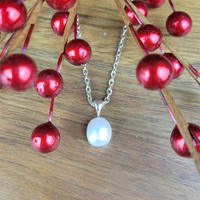 Pearl Bezel Oval Sterling Silver Pendant (stone: 0.5")
