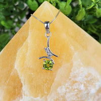 Peridot Round Faceted Prong Pendant w/CZ Accents-sterling silver