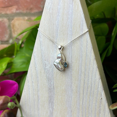 Freeform Pearl and Blue Topaz Accent sterling silver Pendant