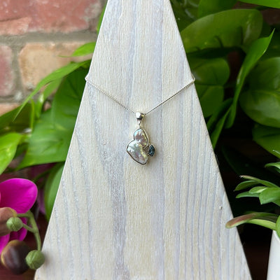 Freeform Pearl and Blue Topaz Accent sterling silver Pendant