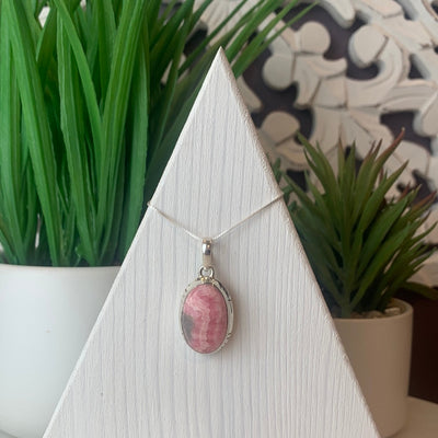Rhodochrosite Freeform Pendant in sterling silver (1.5cm x 2.5cm)