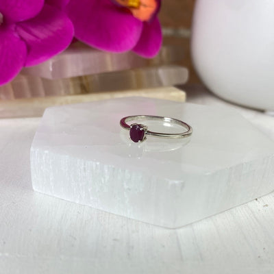 Ruby Round Faceted Ring with Sterling Silver Prong Setting in a Sized Band